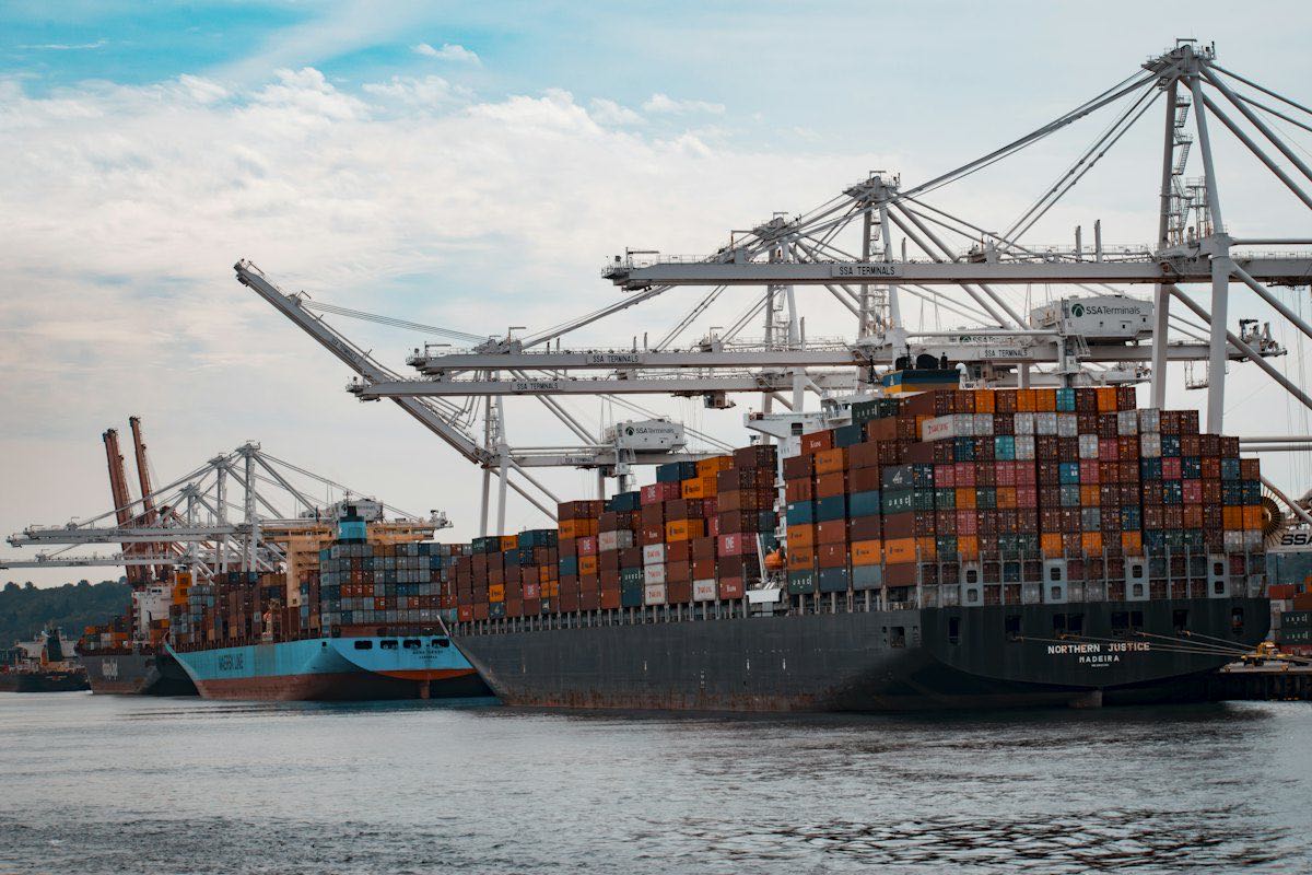 Container ship being unloaded at a port